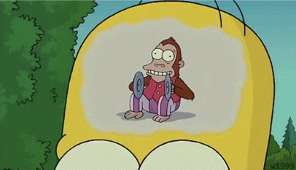 Zoomed in brain of Homer Simpson showing a crazy monkey bouncing 2 plates.